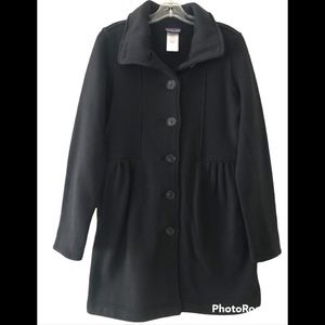 Woman’s black Patagonia coat